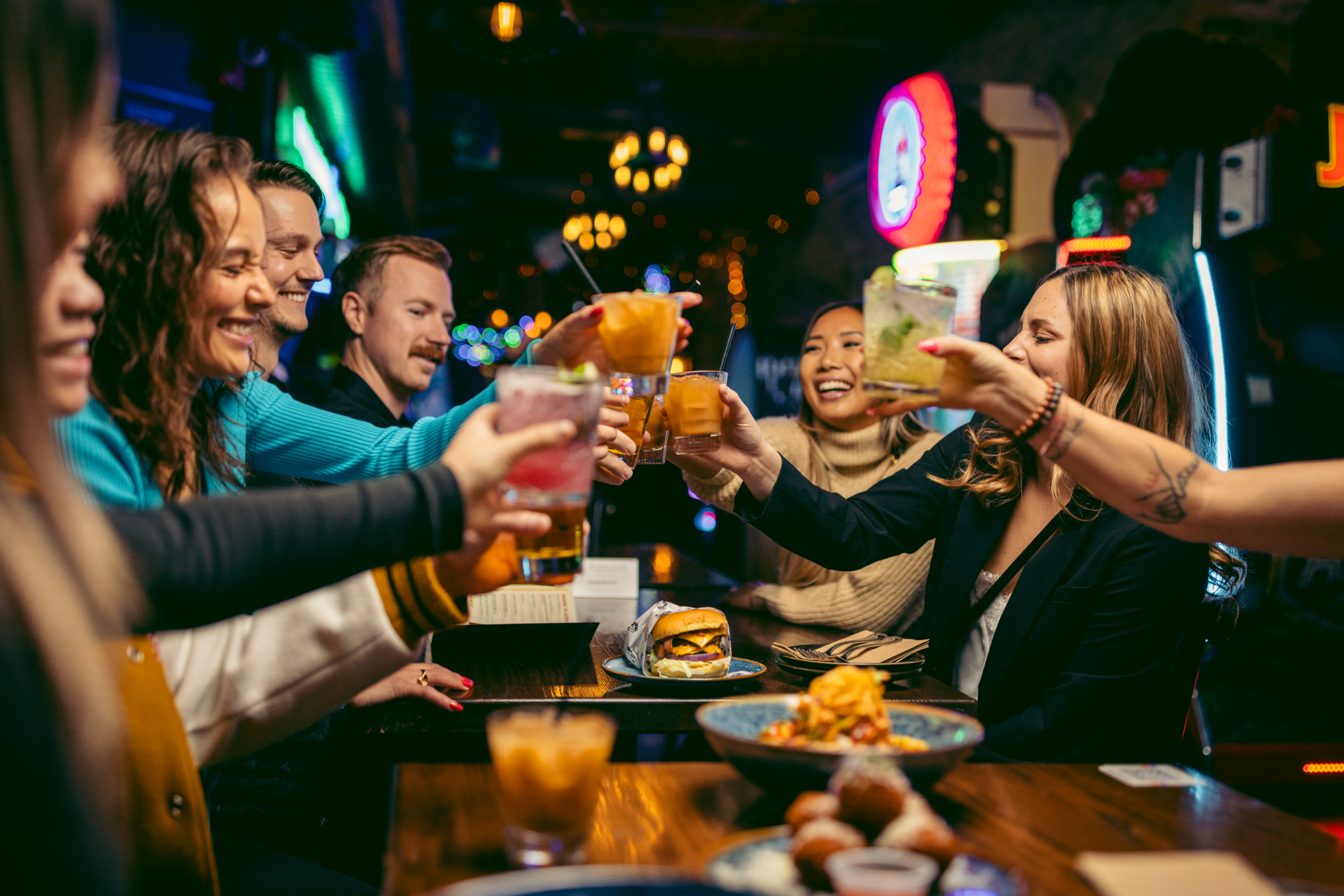 Guests enjoying food, drinks and games at Greta Bar