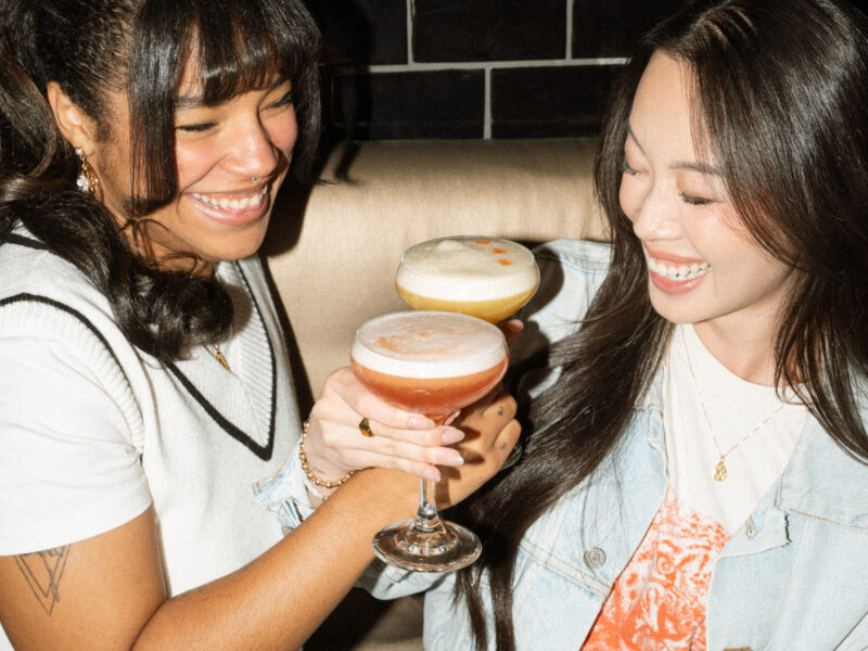 Guests enjoying food, drinks and games at Greta Bar