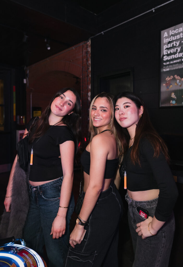 Guests enjoying food, drinks and games at Greta Bar