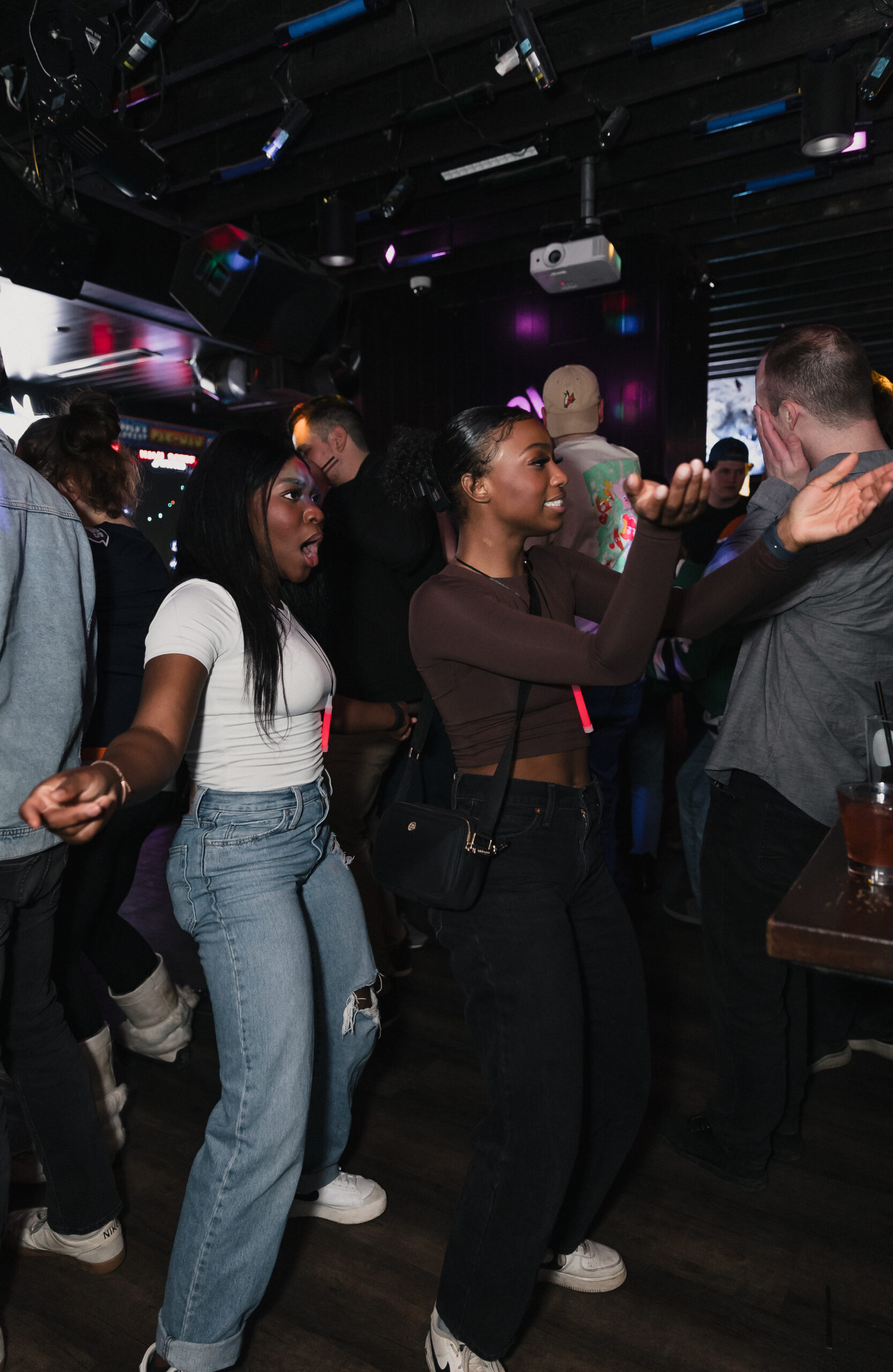 Guests enjoying food, drinks and games at Greta Bar