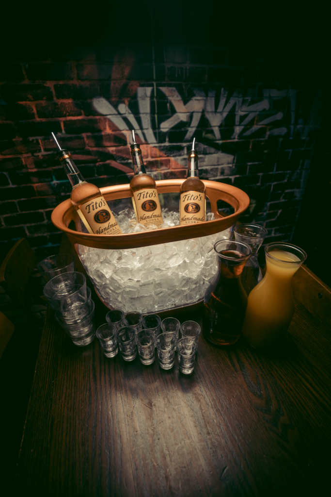 Drinks and cocktails at Greta Bar, showcasing the bar atmosphere, beverages, and alcohol range