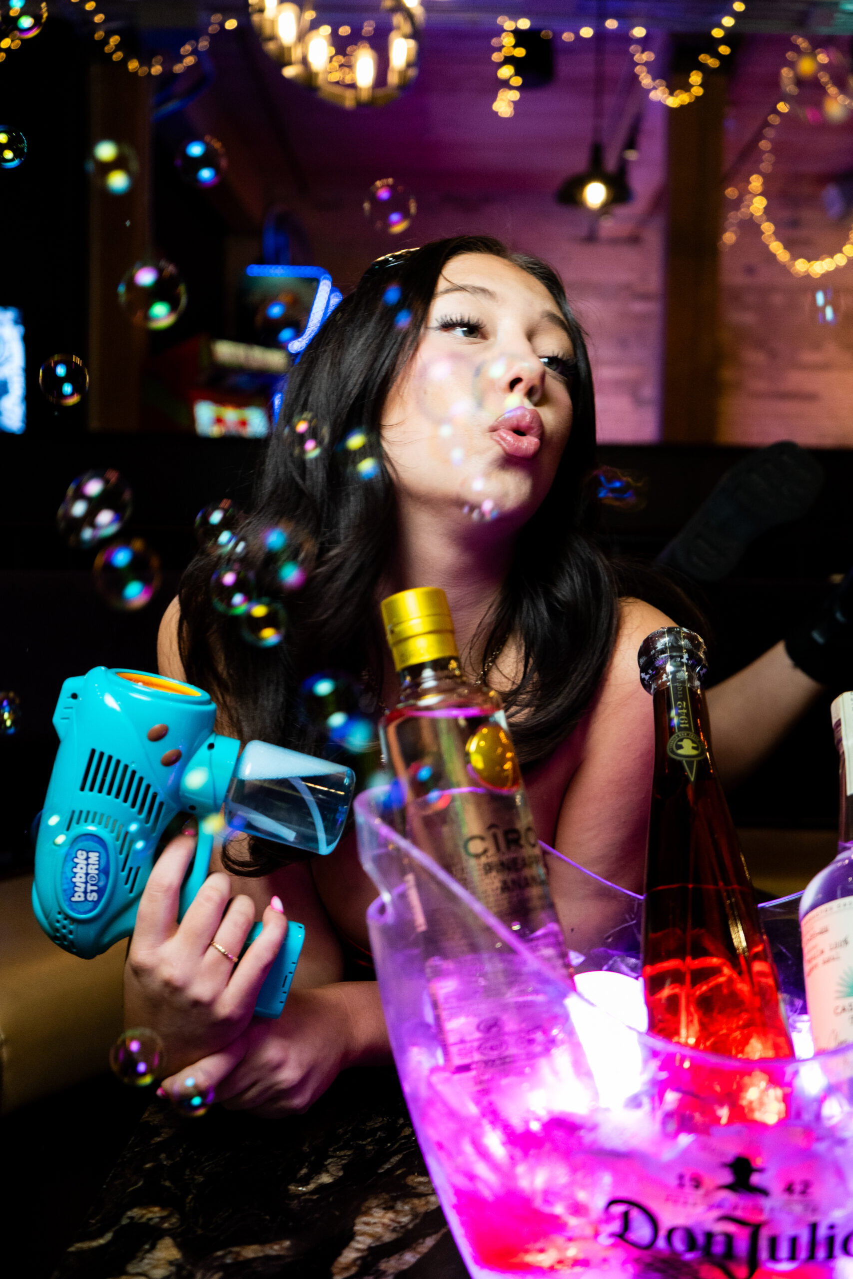 Guests enjoying food, drinks and games at Greta Bar