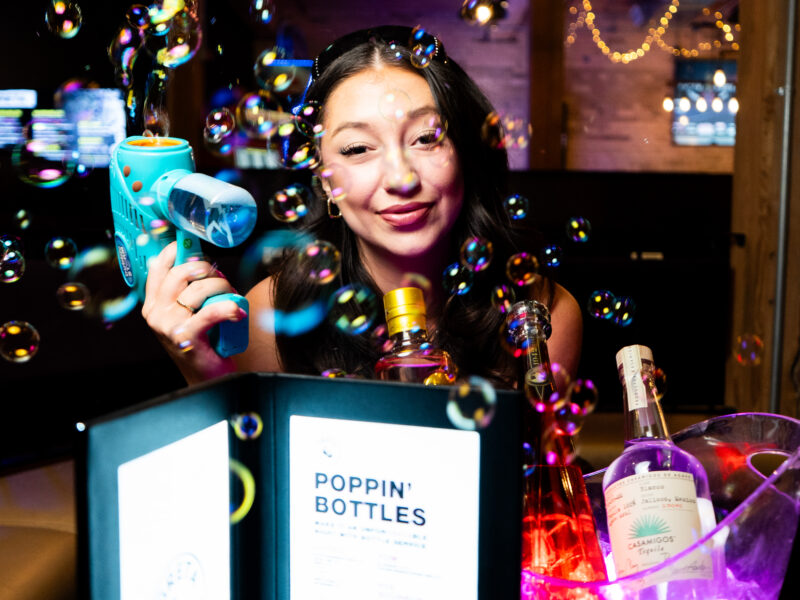 Guests enjoying food, drinks and games at Greta Bar