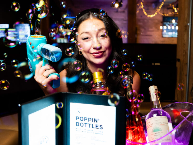 Guests enjoying food, drinks and games at Greta Bar