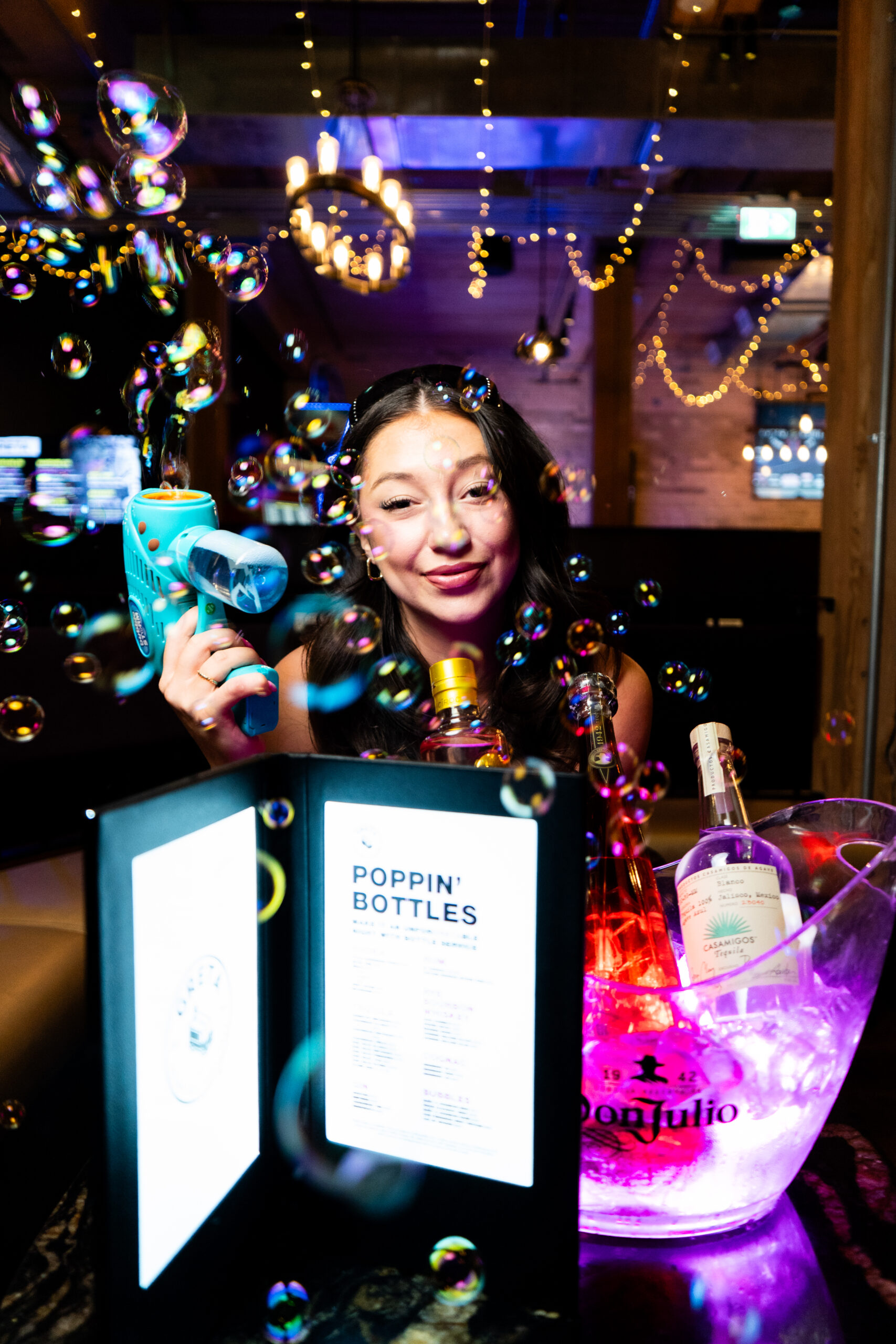 Guests enjoying food, drinks and games at Greta Bar