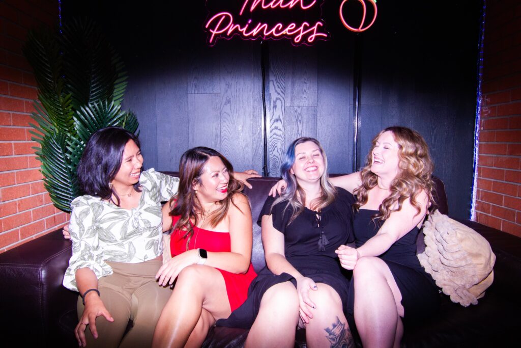 Guests enjoying food, drinks and games at Greta Bar