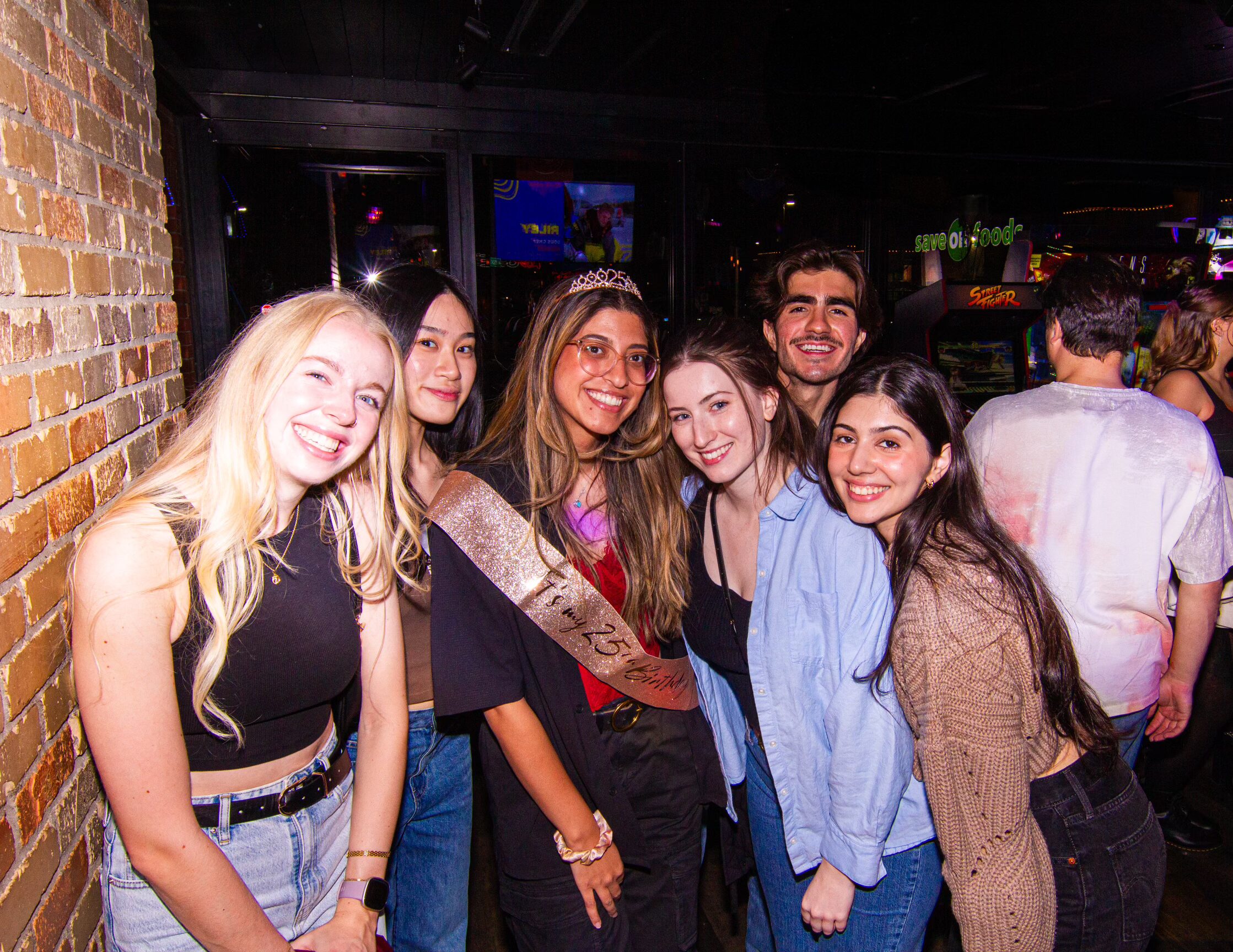 Guests enjoying food, drinks and games at Greta Bar