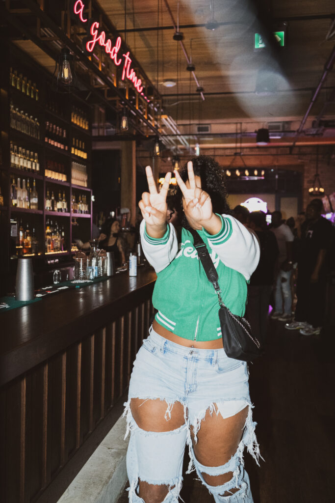 Guests enjoying food, drinks and games at Greta Bar