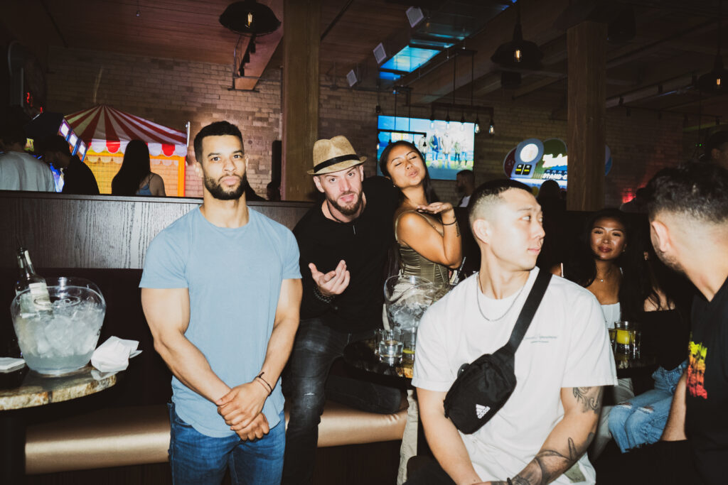 Guests enjoying food, drinks and games at Greta Bar