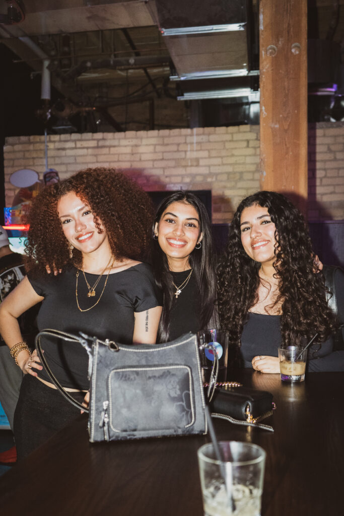 Guests enjoying food, drinks and games at Greta Bar