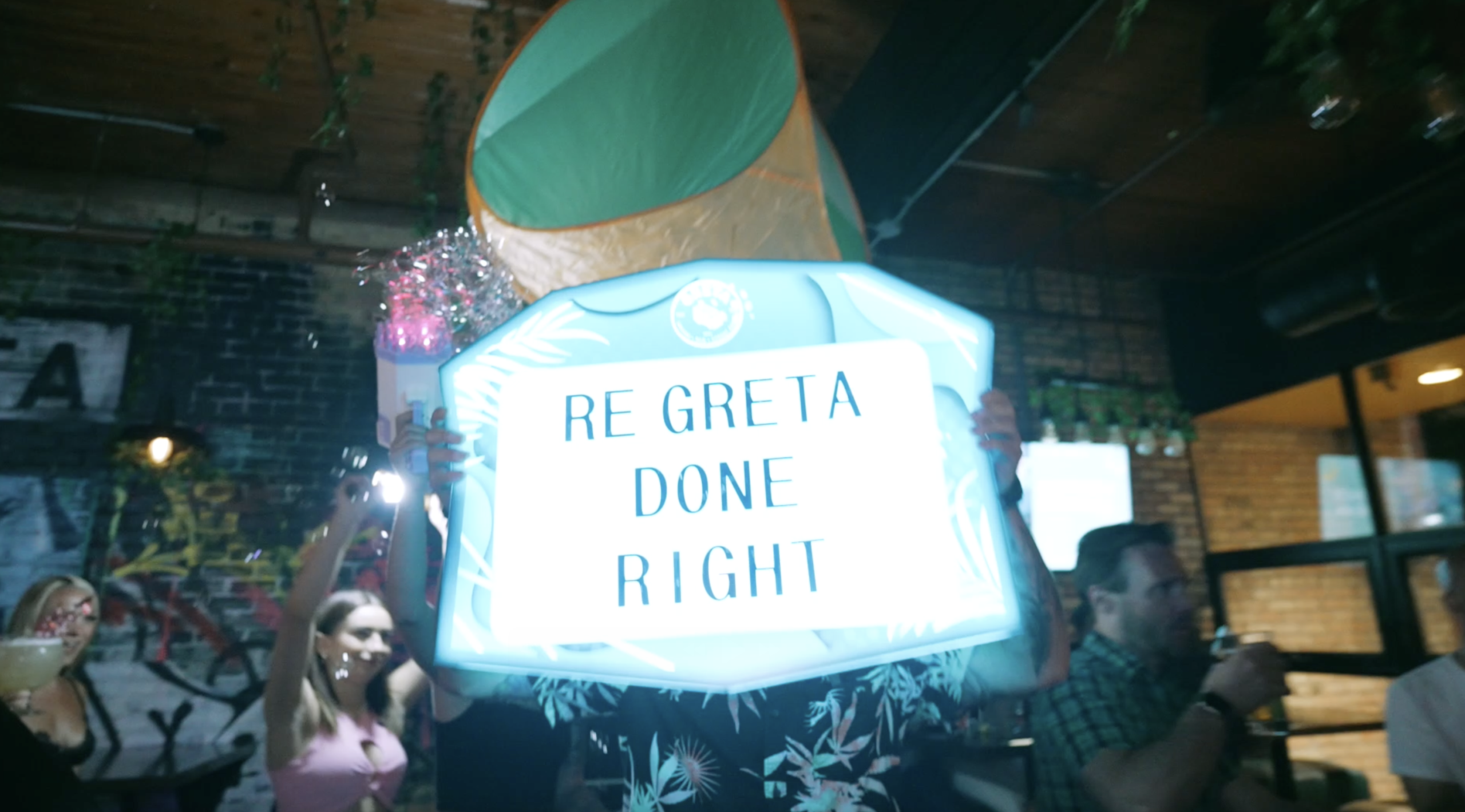 Guests enjoying food, drinks and games at Greta Bar